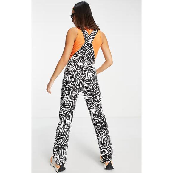 ASOS DESIGN denim '90's' straight leg overalls in zebra print - Picture 2 of 4